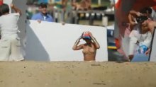 Видео и фото Рианна голая на пляже на фотосессии